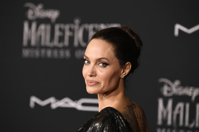 LOS ANGELES, CALIFORNIA - SEPTEMBER 30: Angelina Jolie attends the World Premiere Of Disney's Maleficent: Mistress Of Evil" - Red Carpet at El Capitan Theatre on September 30, 2019 in Los Angeles, California.   Frazer Harrison/Getty Images/AFP
== FOR NEWSPAPERS, INTERNET, TELCOS & TELEVISION USE ONLY ==
