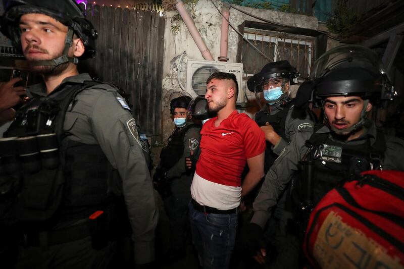 Israeli police detain a Palestinian protester amid ongoing tension ahead of an upcoming court hearing in an Israel-Palestinian land-ownership dispute in the Sheikh Jarrah neighbourhood of East Jerusalem. Reuters