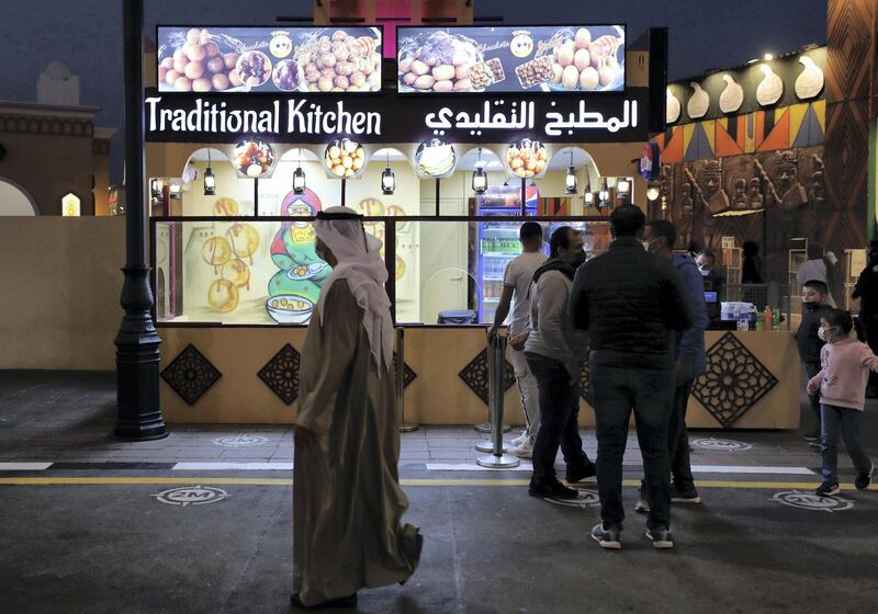 Dubai, United Arab Emirates - Reporter: Janice Rodrigues. Lifestyle. Food. A traditional Emirati kitchen cooks loghaimat and raghagh. Food vendors from all over the world at Gobal Village. Dubai. Sunday, January 17th, 2021. Chris Whiteoak / The National