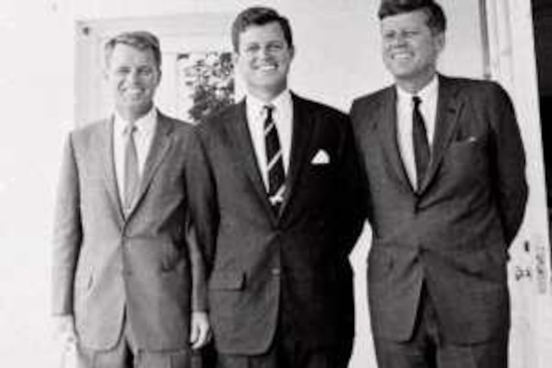 FILE - In this 1962 file photo, Sen. Edward M. Kennedy, center, poses with his brothers U. S. Attorney General Robert F. Kennedy, left, and President John F. Kennedy at the White House in Washington. (AP Photo, File) *** Local Caption ***  NYTK105_Obit_Ted_Kennedy.jpg