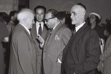 Iranian diplomat Reza Saffinia, centre, chats with then-Israeli prime minister David Ben-Gurion in Jerusalem in 1950. Israel Government Press Office