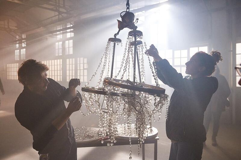 Directed by Daniel Askill, the short begins with a chandelier crashing to the floor of a dusty warehouse. Courtesy Chanel