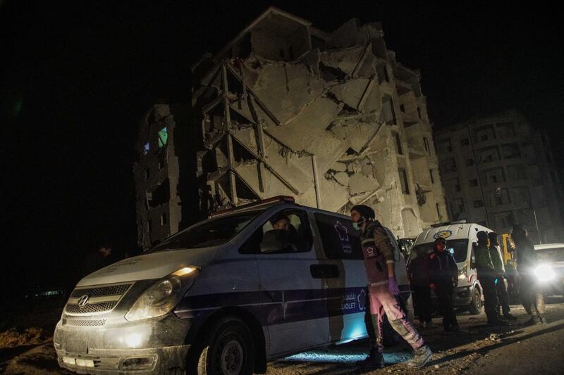 Emergency services and first aiders search for victims following an explosion in an area of the rebel-held city of Idlib, northwestern Syria. Yahya Nemah / EPA