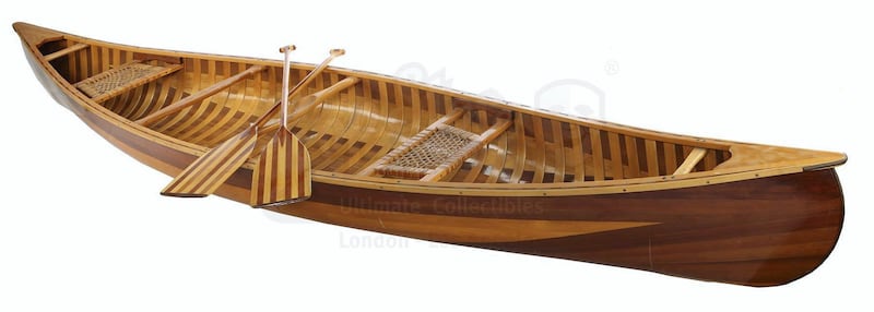 Joey Tribbiani and Chandler Bing's Wood Canoe and Two Paddles. Courtesy Prop Store. Courtesy Prop Store