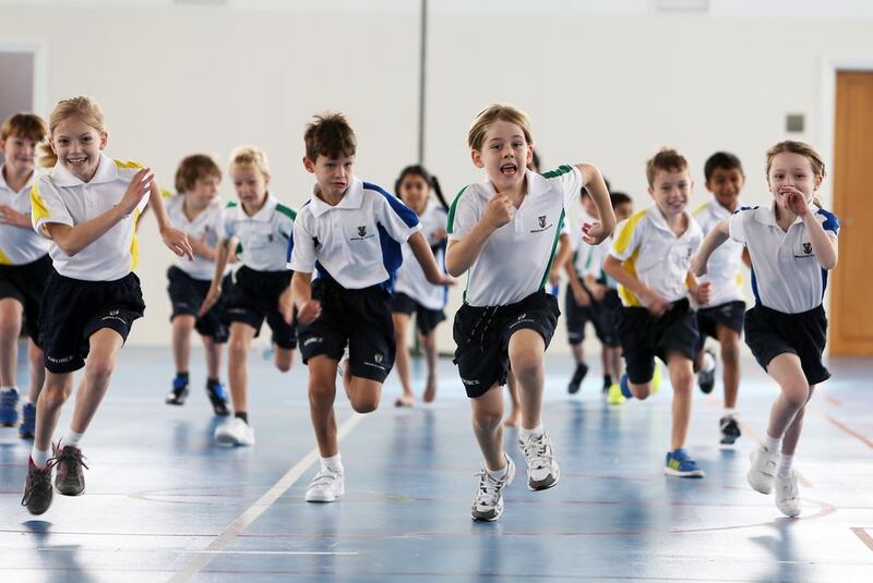 Year 3 pupils are pictured during physical education at the Brighton College Abu Dhabi. Brighton College is to expand into Dubai. Pawan Singh / The National