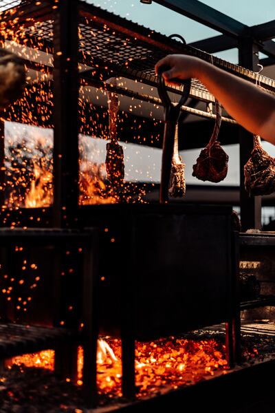 Fiya has four live-fire stations and an open grill. Photo: Fiya