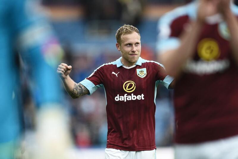 Scott Arfield and his Burnley teammates still have their Premier League destiny in their own hands. Oli Scarff / AFP