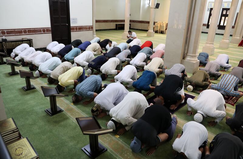 The faithful at prayer in Jumeirah Mosque in Dubai on the day the UAE learnt President Sheikh Khalifa had died. Pawan Singh / The National 