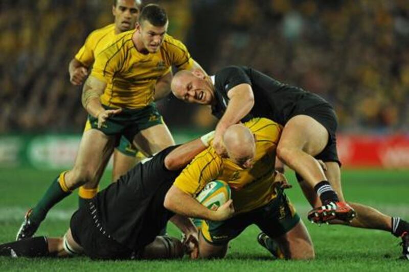 Australia's Stephen Moore is tackled during the Rugby Championship clash with New Zealand.
