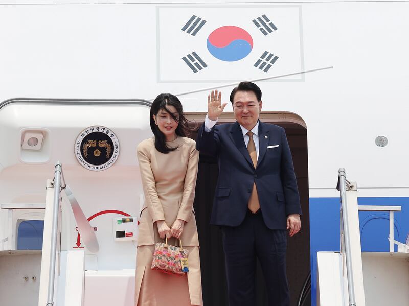 South Korean President Yoon Suk-yeol, with his wife Kim Keon-hee, at Soekarno-Hatta International Airport in Jakarta, en route to the G20 summit in New Delhi. EPA