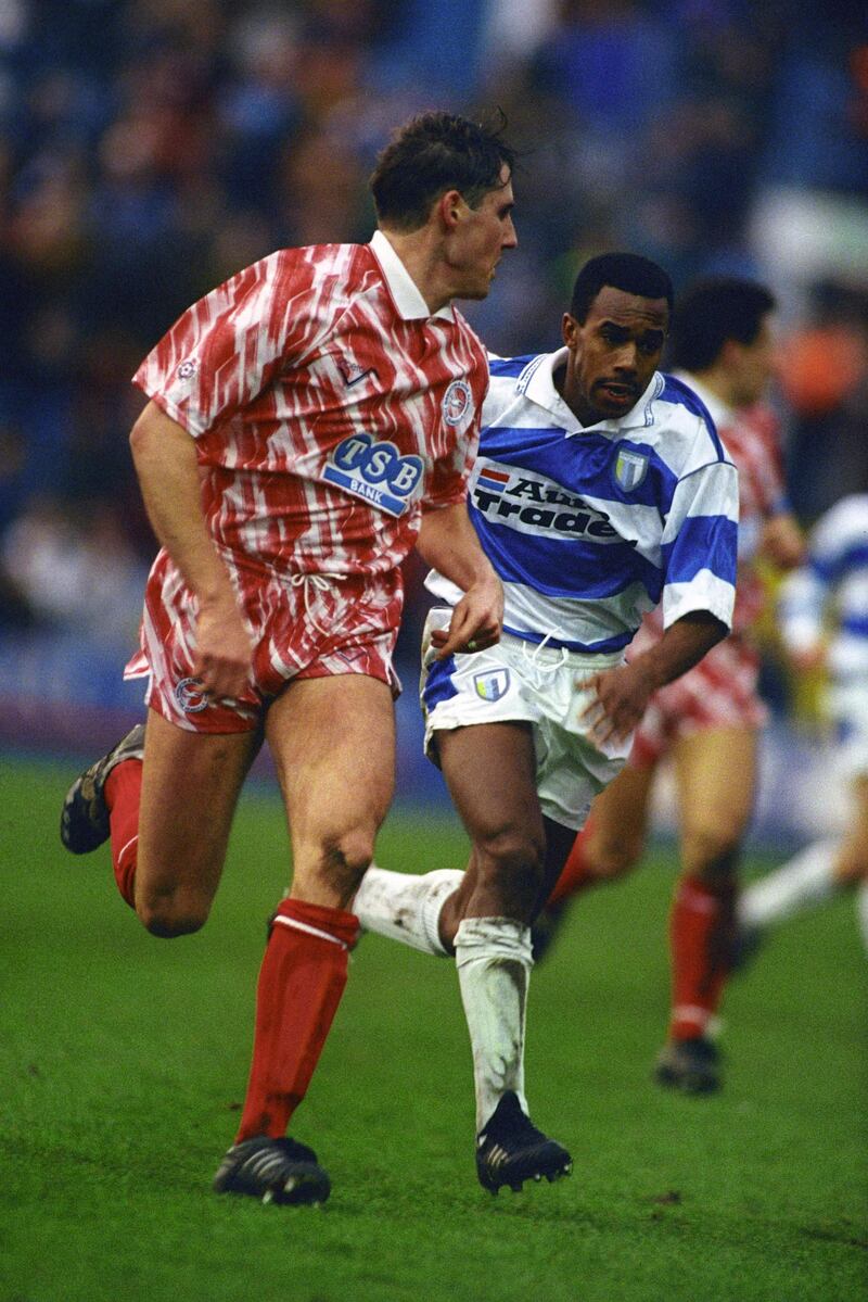 Brighton & Hove Albion's Nicky Bissett (l) and Reading's Michael Gilkes (r).  (Photo by Paul Marriott/EMPICS via Getty Images)
