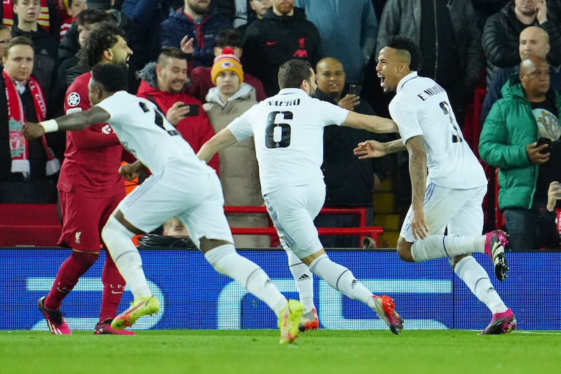 Militao, right, celebrates after scoring. AP