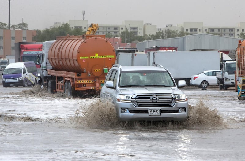 Dubai, United Arab Emirates - Flooded street due to rain today in Al Quoz Industrial area.  Leslie Pableo for The National 