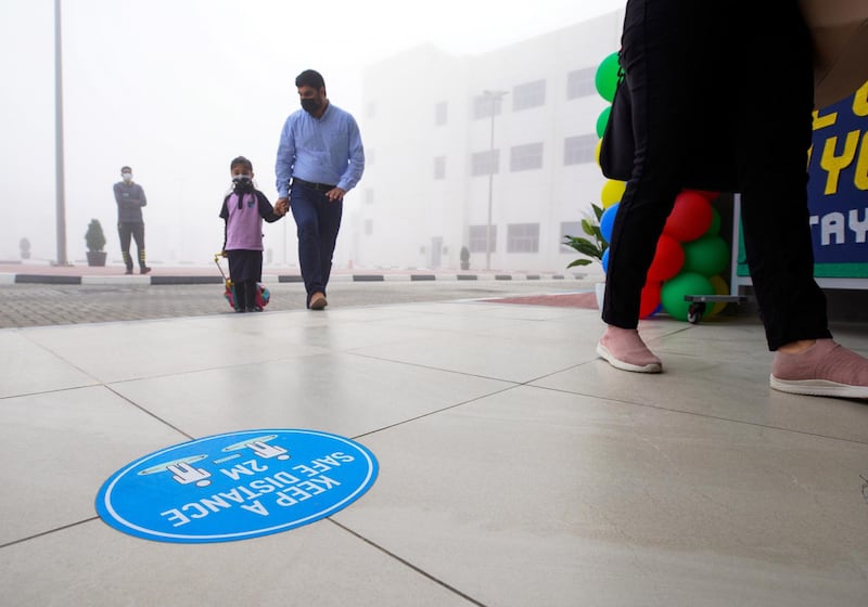 Abu Dhabi, United Arab Emirates, February 14, 2021. Pupils return to Abu Dhabi's private schools. GEMS United Indian School – Abu Dhabi.  A few students arrive in spite of the foggy conditions.Victor Besa/The NationalSection: NAReporter:  Anam Rizvi