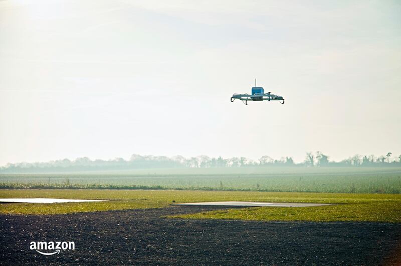 FILE- This Dec. 7, 2016, file photo provided by Amazon shows an Amazon Prime Air drone in Cambridgeshire, United Kingdom. Amazon founder and CEO Jeff Bezos might have underestimated regulatory obstacles and privacy concerns when he told CBSâ€™ â€œ60 Minutesâ€ in December 2013 that his company would be making drone-borne deliveries within five years. (Amazon via AP, File)