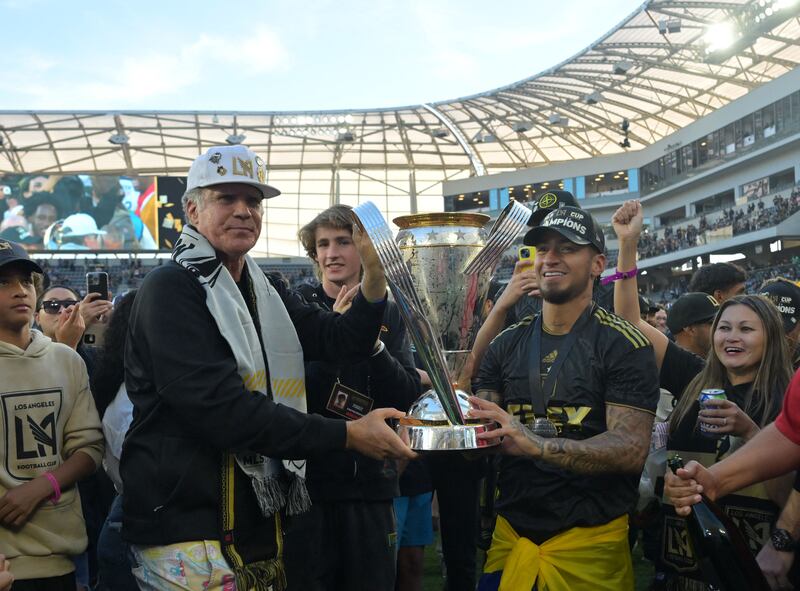 Will Ferrell celebrates with Los Angeles FC players and the MLS Cup. USA Today