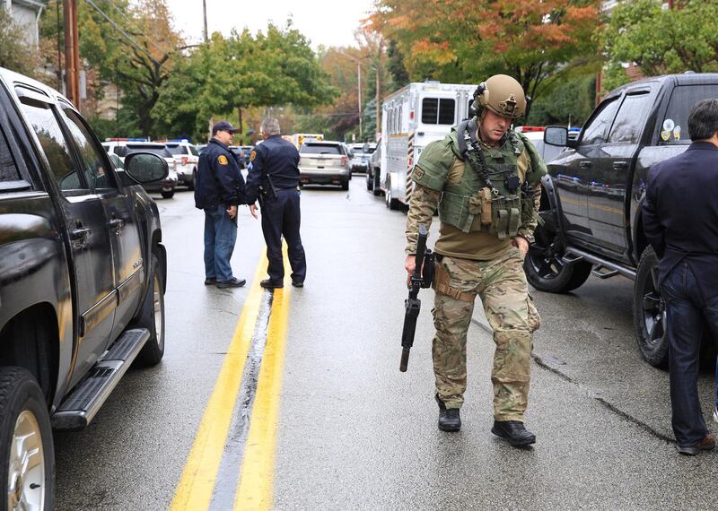 A SWAT police officer and other first responders at the scene after a gunman opened fire at the Tree of Life synagogue. Reuters