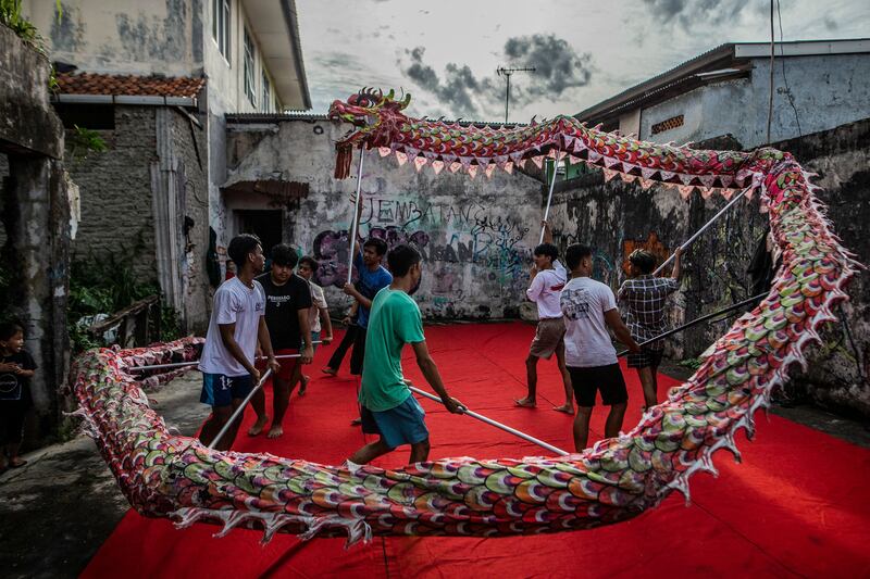 A dragon dance troupe in Bogor, Indonesia, practise for the Lunar New Year celebrations. AFP


