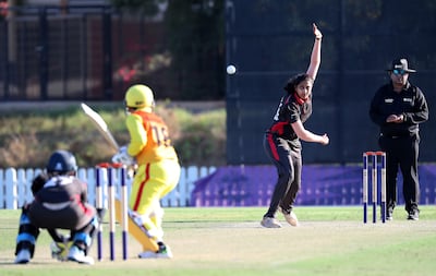 Esha Oza bowls during the ICC Women's T20 World Cup Asia Region qualifier against Bhutan at the ICC Academy in Dubai in 2021. Pawan Singh / The National