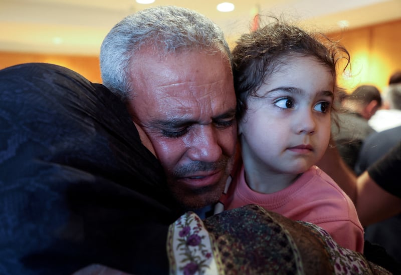 Ali Mazloum, a Lebanese citizen who was evacuated from Sudan, is welcomed upon his arrival at Beirut airport on April 25. Reuters