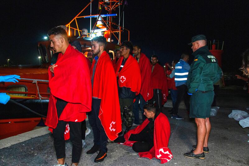 Migrants arrive at the port in Motril, southern Spain, after being rescued at sea by Spanish authorities. EPA
