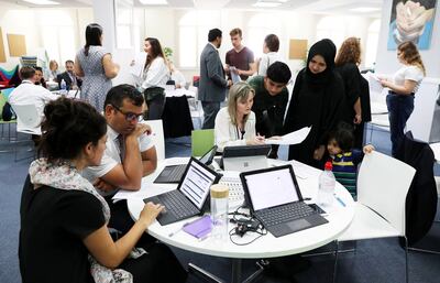 
ABU DHABI ,  UNITED ARAB EMIRATES , AUGUST 22 – 2019 :- Students receiving their GCSE results at the Brighton College in Abu Dhabi. ( Pawan Singh / The National ) For News. Story by Kelly
