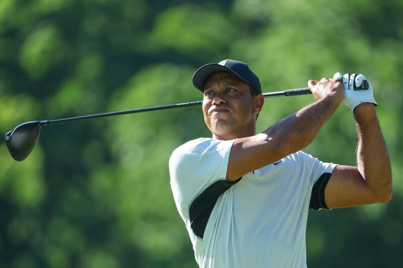 Tiger Woods plays a tee shot during a practice round prior to the start of the 2022 PGA Championship. AFP
