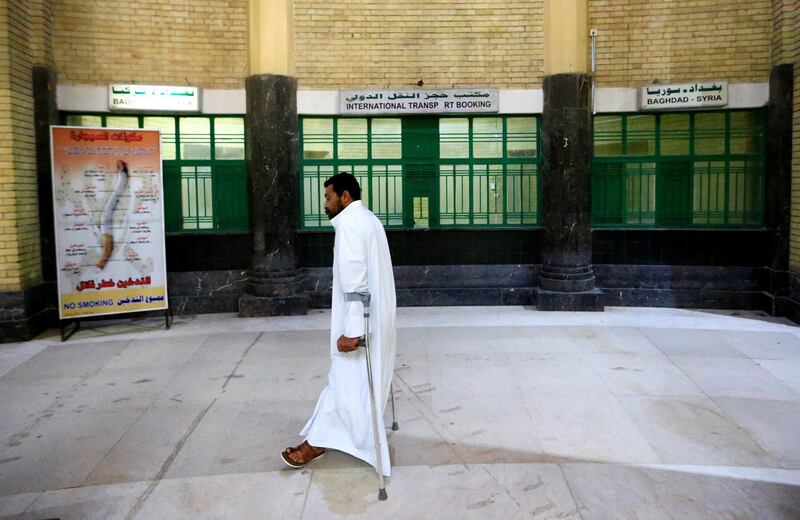 A passenger walks inside Baghdad's central railway station. Reuters