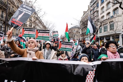 People participate in a demonstration in Paris in support of the Palestinian people. EPA