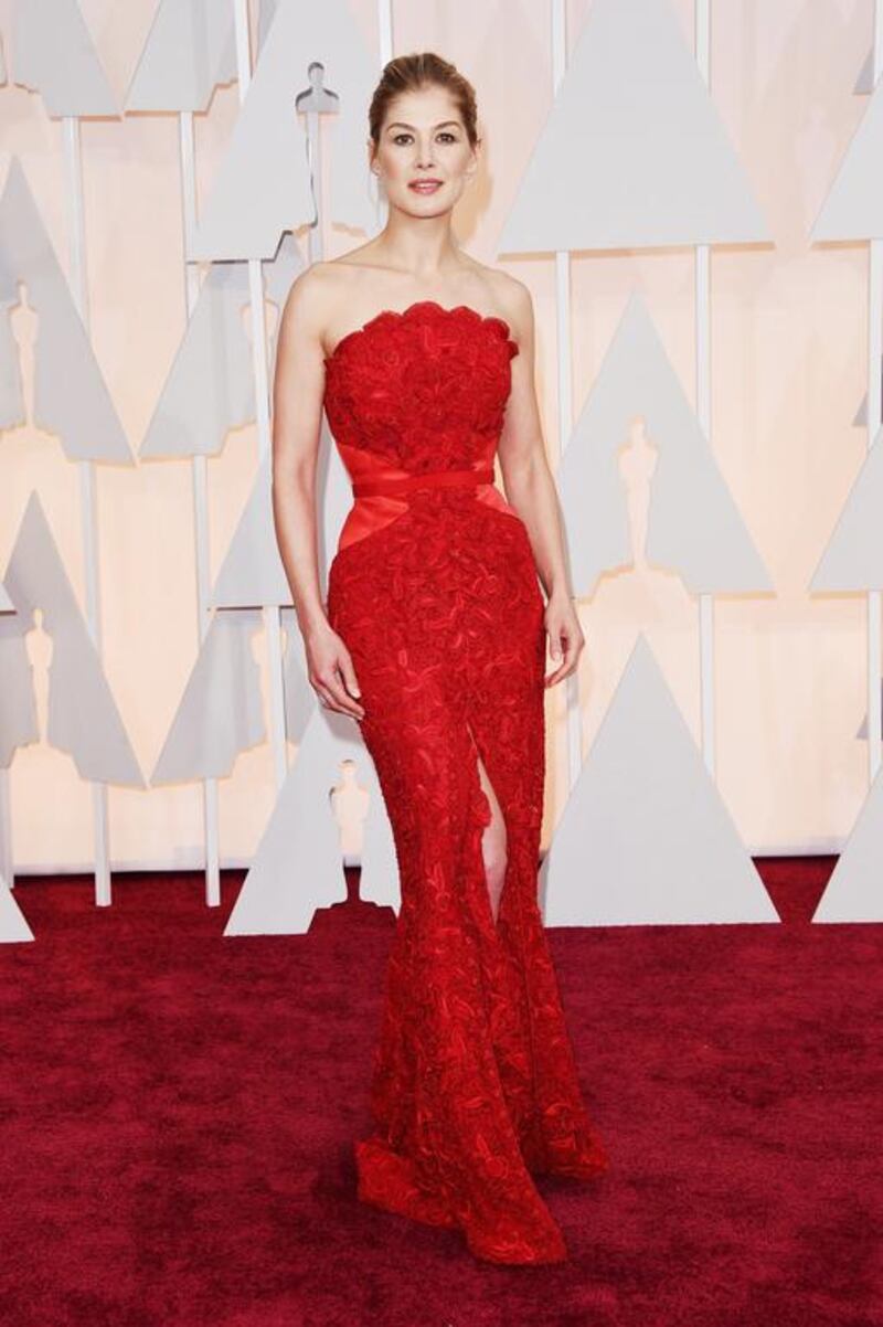 Rosamund Pike looked haughty yet ultra feminine; literally taking the Rose out of Rosamund in a red Givenchy number. The thigh high split and skinny, strappy sandals took the dress far from frumpy. Jason Merritt / Getty Images / AFP