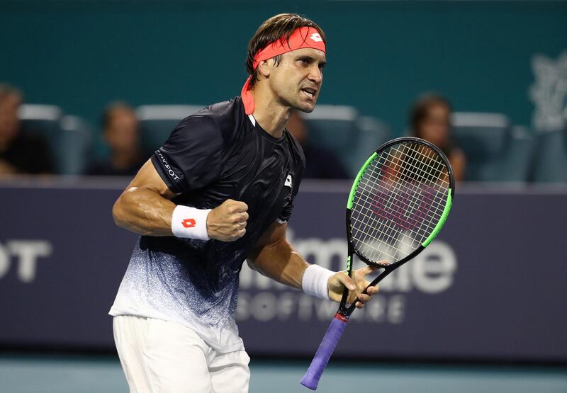 MIAMI GARDENS, FLORIDA - MARCH 25: David Ferrer of Spain celebrates a point against Frances Tiafoe during day 8 of the Miami Open presented by Itau at Hard Rock Stadium on March 25, 2019 in Miami Gardens, Florida.   Al Bello/Getty Images/AFP
