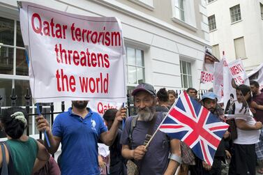 A demonstration outside the Qatar Embassy in London during Emir Tamim bin Hamad Al Thani's visit to London. Stephen Lock for The National