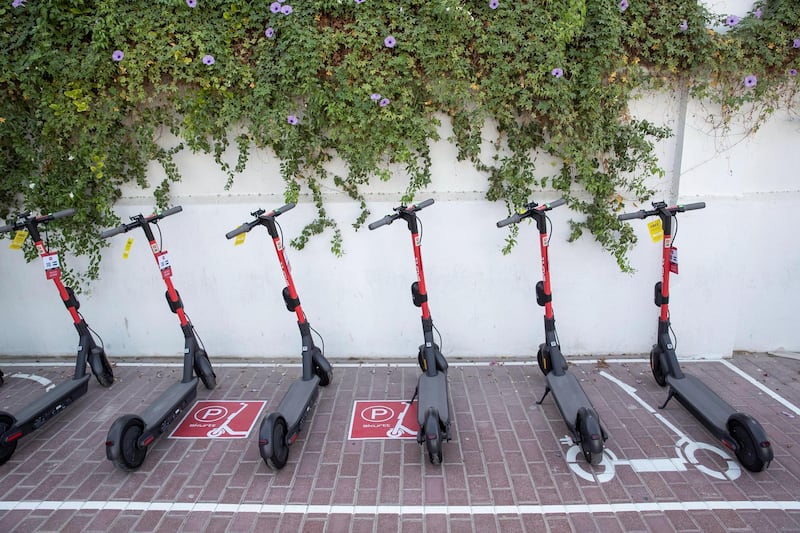DUBAI, UNITED ARAB EMIRATES. 26 OCTOBER 2020. E-scooter trials rolled out in five areas across city for a year long project for commuters to rent and use e-scooters while commuting to and from tram and metro stations. SKURTT e-scooters for rent at the Al Sufouh Tram Station in Knowledge Village. (Photo: Antonie Robertson/The National) Journalist: Kelly Clarke. Section: National.
