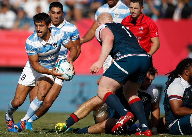 Argentina's scrum-half Felipe Ezcurra (L) looks to pass the ball during the Japan 2019 Rugby World Cup Pool C match between Argentina and the United States at the Kumagaya Rugby Stadium in Kumagaya. AFP