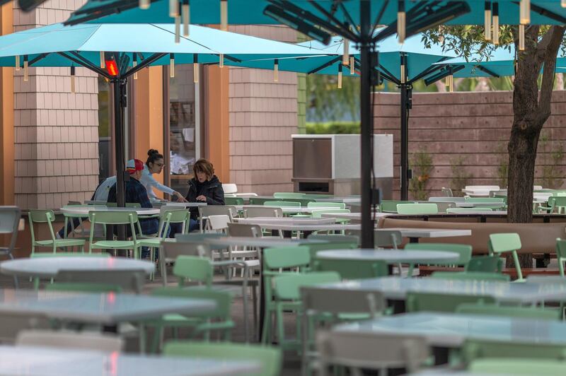 Business appears slow at the Naples Ristorante e Bar restaurant in Downtown Disney District shopping mall, which remains open on the first day of the closure of Disneyland and Disney California Adventure theme parks as fear of the spread of coronavirus continue, in Anaheim, California, on March 14, 2020. - The World Health Organization said March 13, 2020 it was not yet possible to say when the COVID-19 pandemic, which has killed more than 5,000 people worldwide, will peak. "It's impossible for us to say when this will peak globally," Maria Van Kerkhove, who heads the WHO's emerging diseases unit, told a virtual press conference, adding that "we hope that it is sooner rather than later". (Photo by DAVID MCNEW / AFP)