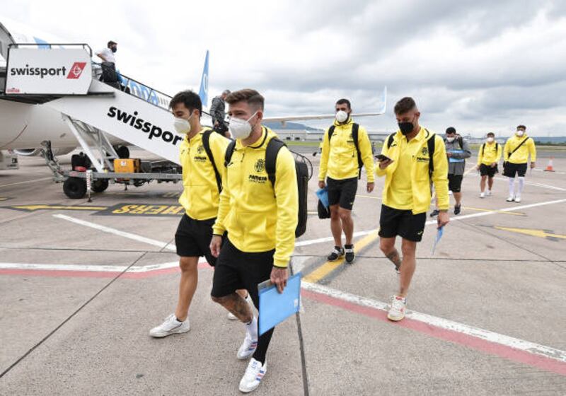 Alberto Moreno of Villarreal and teammates arrive at George Best Belfast City Airport.