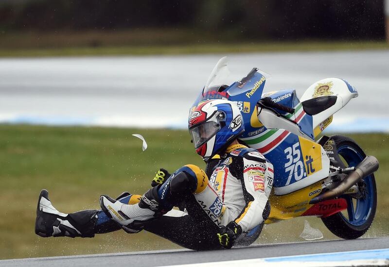 3570 Team Italia’s Italian rider Lorenzo Petrarca crashes out during the first practice session of the Moto 3 ahead of 2016 Australian Grand Prix at Phillip Island. Saeed Khan / EPA