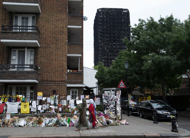 Local landmarks covered in flowers and tributes.