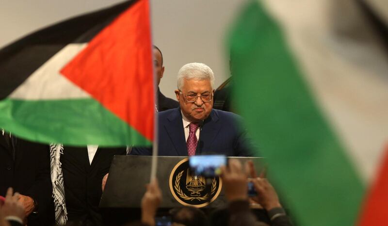 epa07255648 Palestinian President Mahmoud Abbas attends a ceremony marking the 54th anniversary of the launch of the Palestinian liberation revolution and Fateh movement, in the the West Bank city of Ramallah, 31 December  2018.  EPA/ALAA BADARNEH