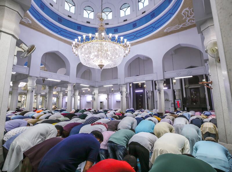 Morning prayers at the Sheikh Khalifa bin Zayed the First Mosque on Friday. Victor Besa / The National