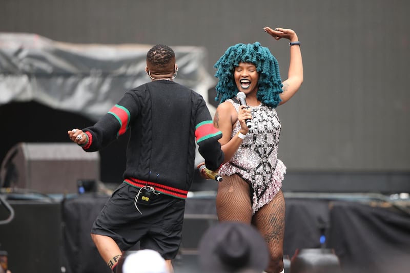 Nigerian singer and songwriter Wizkid and South African singer Moonchild Sanelly, right, perform together. Getty