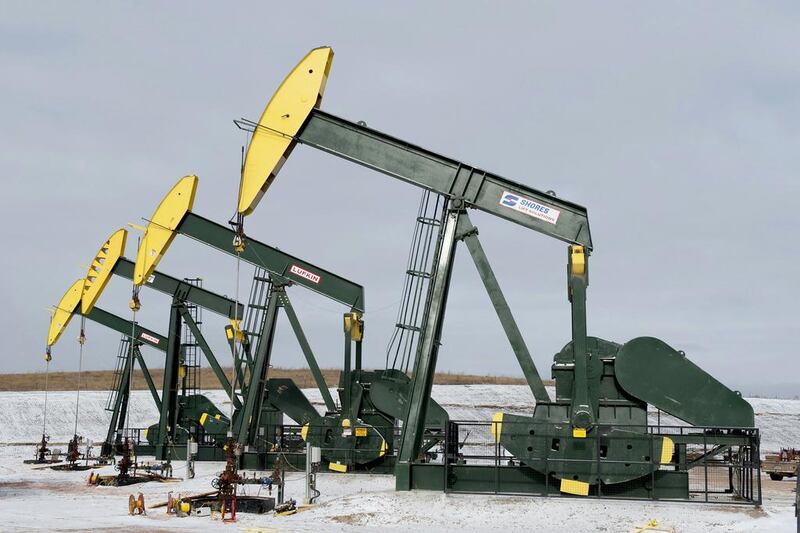 Pumpjacks taken out of production temporarily stand idle at a Hess site near Williston, North Dakota. Reuters