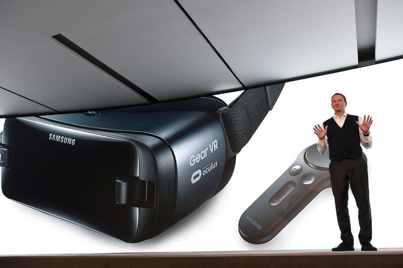 Chief marketing officer of Samsung Electronics Europe, David Lowes, presents the tablet Samsung Gear VR controller. AFP