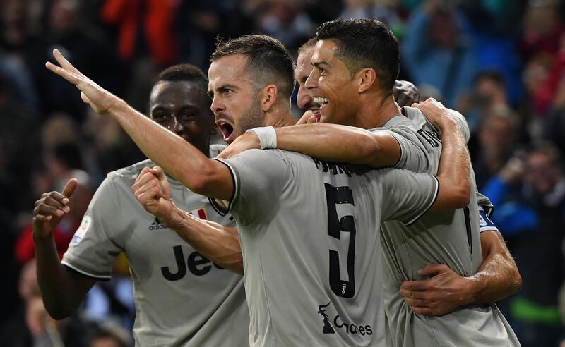 Ronaldo celebrates after scoring his team's second goal with teammates. Getty Images