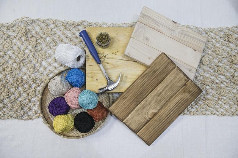 Supplies needed for a string-art project. Mona Al Marzooqi / The National 