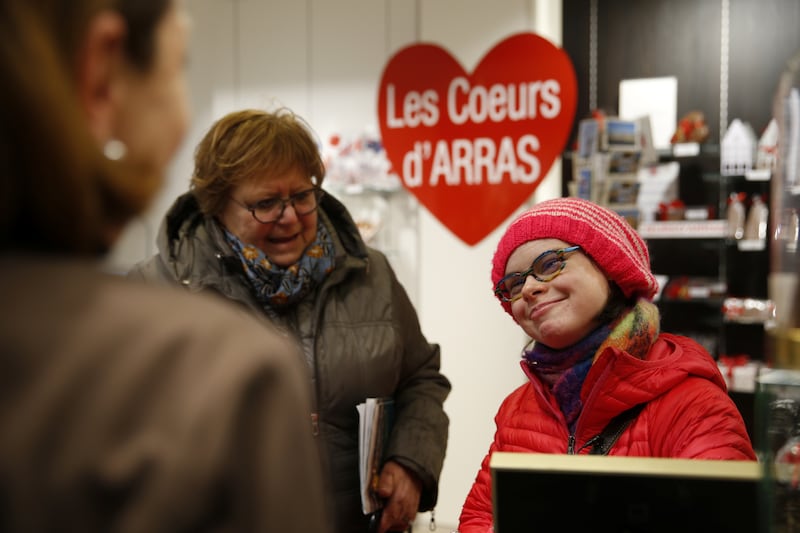 Eleonore Laloux, 34, a candidate for the next local elections, and co-candidate Sylvie Noclercq campaign in the streets of Arras, France. Reuters