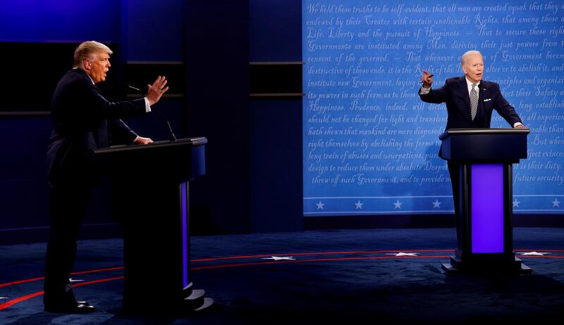 US President Donald Trump and Democratic presidential nominee Joe Biden participate in their first 2020 presidential campaign debate held on the campus of the Cleveland Clinic at Case Western Reserve University in Cleveland, Ohio. Reuters