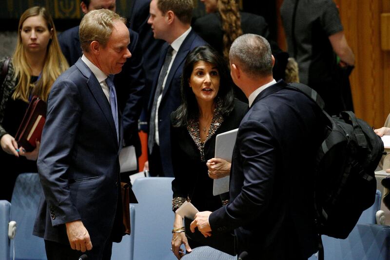 U.S. Ambassador to the United Nations Nikki Haley speaks with Nickolay Mladenov (R), the United Nations' Special Coordinator for the Middle East Peace Process and British Ambassador to the U.N. Matthew Rycroft (L) following a United Nations Security Council meeting on the situation in the Middle East, including Palestine, at U.N. Headquarters in New York City, New York, U.S., December 18, 2017. REUTERS/Brendan McDermid