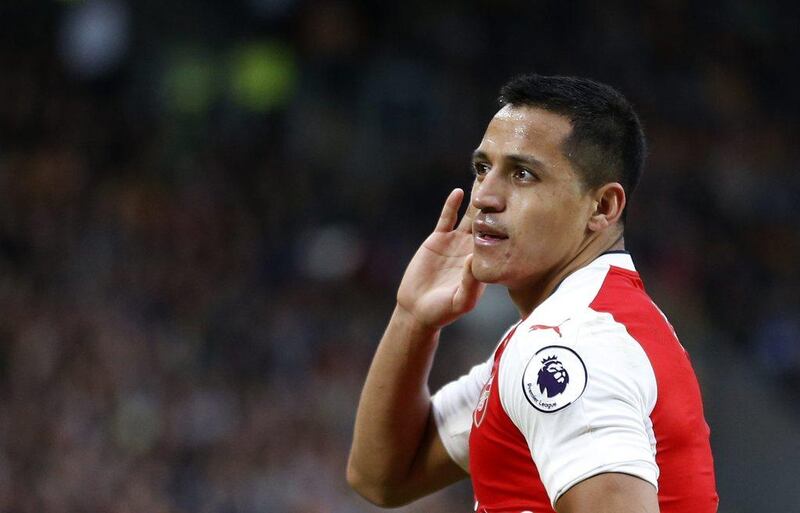 Arsenal’s Alexis Sanchez celebrates scoring their third goal. Russell Cheyne / Reuters
