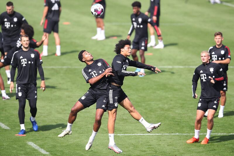 Serge Gnabry battles for the ball with his team mate Leroy Sane. Getty Images